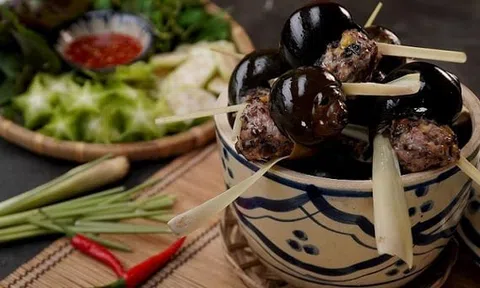Ốc bươu nhồi thịt hấp chấm mắm gừng ấm bụng ngày mưa